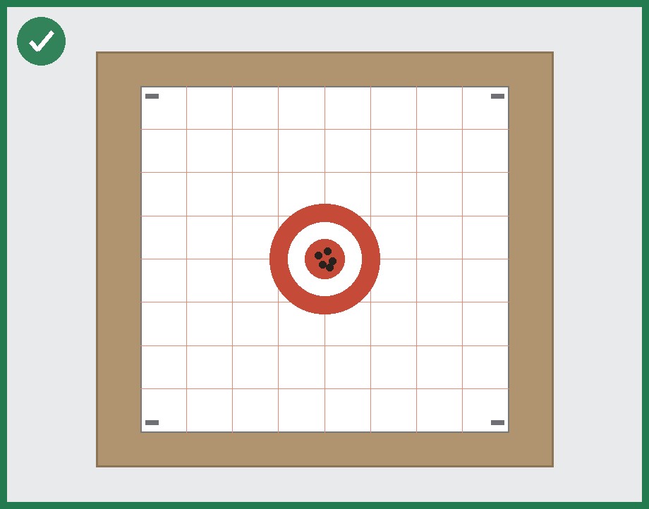A whole paper target mounted on a cardboard backer, photographed square on with space around all four edges.